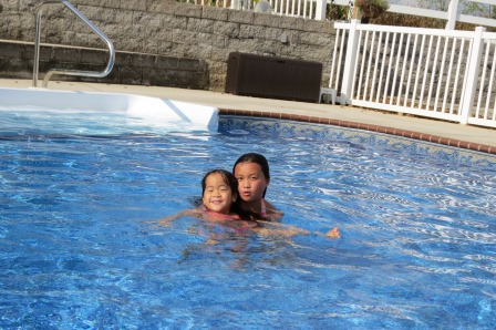 Kasen and Karis in the pool